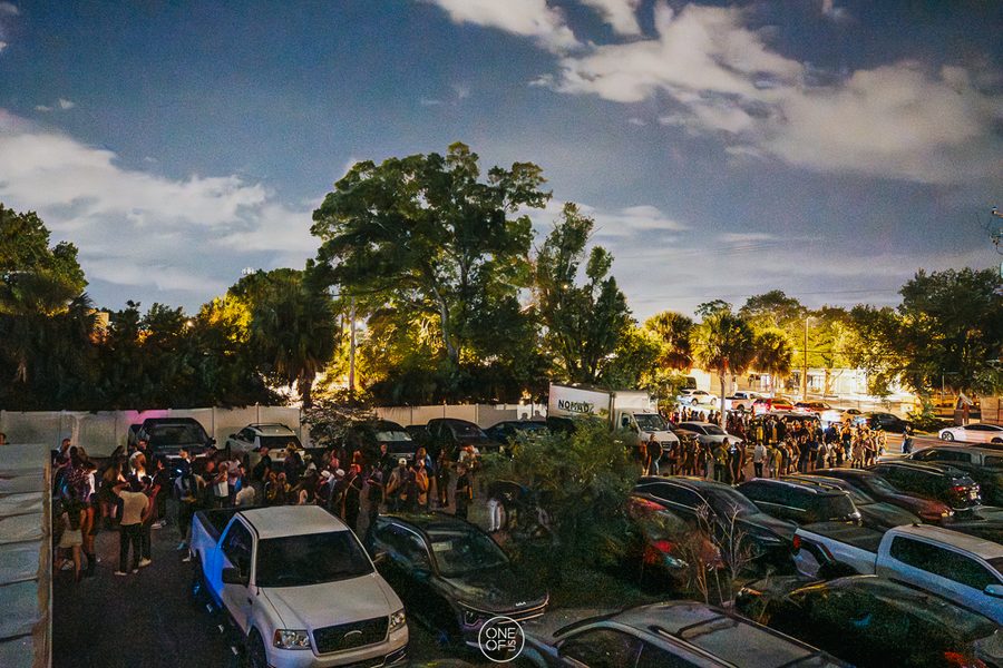 The Shop at dusk, on-site parking and entrance